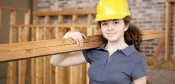 Woman Carrying Lumber